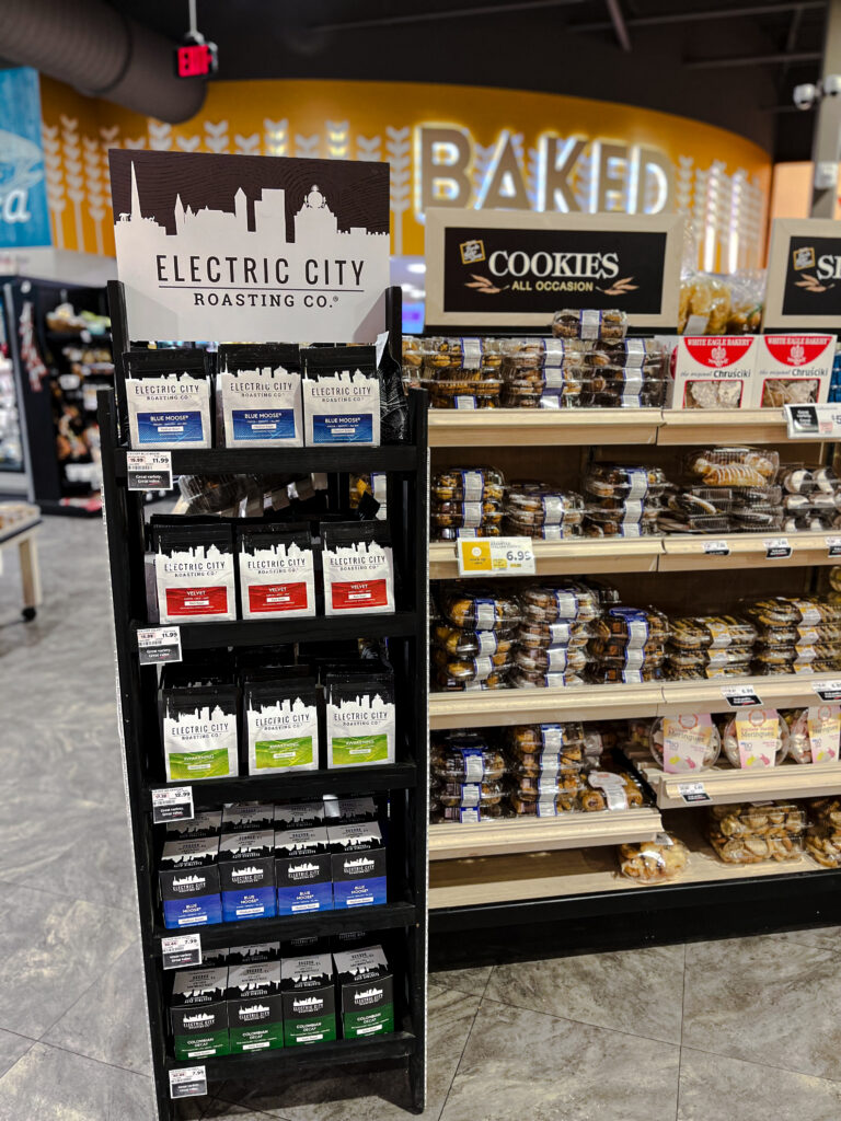 Display case of electric city roasting coffee at shoprite grocery store.